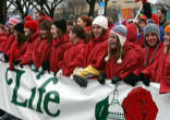 Image of Those who march stand in solidarity with our youngest neighbors whose cry cannot be heard without our voice. 