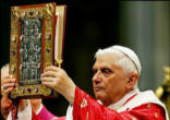 Image of Pope benedict Holds the Book of the Gospels