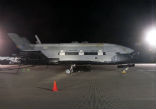 Image of The first secret X37-B after its landing at Vandenberg AFB in 2010. 