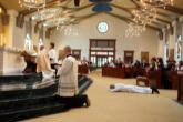Image of The new priests hands being annointed with holy Chrism by the Bishop. All photos taken by and provided with great generosity by Dave Barron.