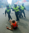 Image of A 78-year-old runner who fell during the bombing has become an icon of the race. Bill Iffring suffered only a scraped knee in his fall. He crossed the finish line anyway. 