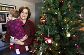 Image of Christa Dias and her baby