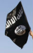 Image of The Islamic State's radicalizing reach has even spread to the U.S., where a Boston man was shot after attacking police with a knife.
