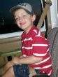 Image of Six-year-old Jeremy Mardis was strapped in the fron passenger seat of his father Chis Few's vehicle when officers shot and killed him (Facebook).