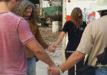 Image of Religious leaders prayed about going to the site to protest.