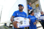 Image of Members of the Knights of Columbus help to deliver supplies to the Casa de Migrantes in Ciudad Juarez Mexico