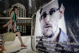 Image of Snowden has disclosed a massive domestic surveillance program that is sweeping up all your personal data. Most Americans appear unconcerned because, look, more Kardashian!