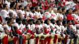 Image of Players have also been divided on the protests, with some joining, and other standing. 